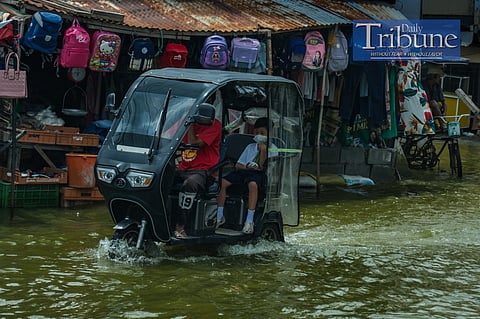 LOOK: Residents of Masantol, Pampanga have adapted to frequent flooding caused by altered waterways, fishponds that impede water flow, and land subsidence exacerbated by volcanic lahars from Mount Pinatubo. Modern development in flood-prone areas without adequate flood mitigation has increased the risk, while climate change has disrupted the historical cycles of flood and drought. To address these issues, President Ferdinand Romualdez Marcos Jr. inaugurated the Integrated Disaster Risk Reduction and Climate Change Adaptation Measure in Pampanga Bay, funded by P7.57 billion from South Korea, which aims to improve flood resilience with extensive river network improvements and new infrastructure. Further infrastructure development and disaster risk reduction efforts are planned to enhance regional flood control.