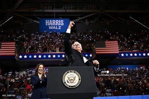 UNITED States Democratic vice presidential candidate Minnesota Governor Tim Walz pumps his fist as Vice President and 2024 Democratic presidential candidate Kamala Harris applauds at Temple University’s Liacouras Center in Philadelphia, Pennsylvania. 
