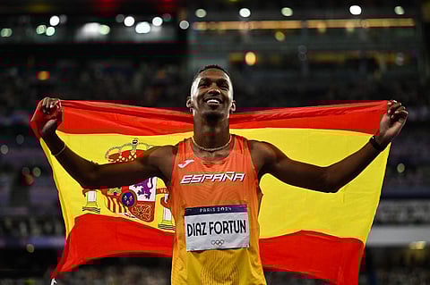 JORDAN Diaz, a Cuban defector, celebrates after winning the gold medal for Spain in the men’s triple jump event of the Paris Olympics.