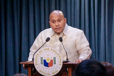 SENATOR Ronald dela Rosa gets a mouthful from Rep. Romeo Acop.