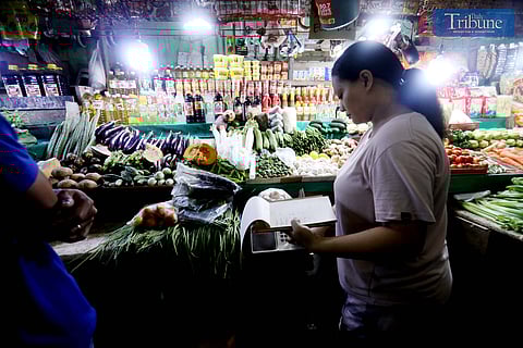 Various vegetables of all shapes, colors and sizes are being sold at stalls inside the Commonwealth Avenue in Quezon City on Tuesday. Photo/Analy Labor