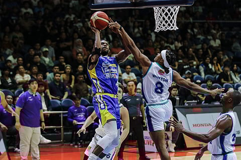 Glenn Robinson III pulls up a jumper against Schonny Winston during Magnolia's 105-93 win over Converge in the PBA Governors' Cup. 