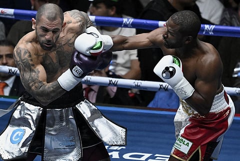 Floyd Mayweather teaches John Gotti III a lesson during their exhibition match Saturday in Mexico City.