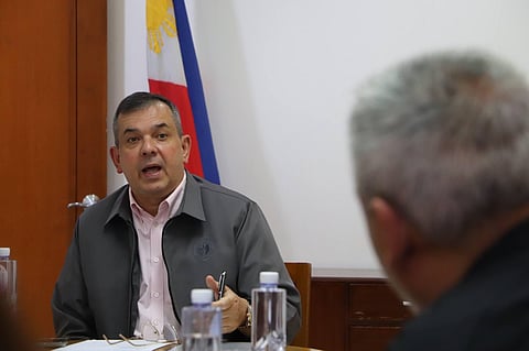 PSC chairman Richard ‘Dickie’ Bachmann stands behind the six-man Philippine team in the Paris Paralympics.