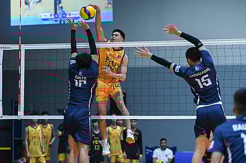 Amet Bituin and FEU soar past Letran College, 26-24, 22-25, 25-19, 29-27, in the V-League Men’s Collegiate Challenge at the Paco Arena in Manila on Sunday.