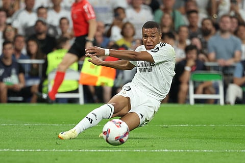 KYLIAN Mbappe shoots a goal to lift Real Madrid to a 2-0 win over Real Betis in the La Liga at the Santiago Bernabeu Stadium in 
Madrid. 