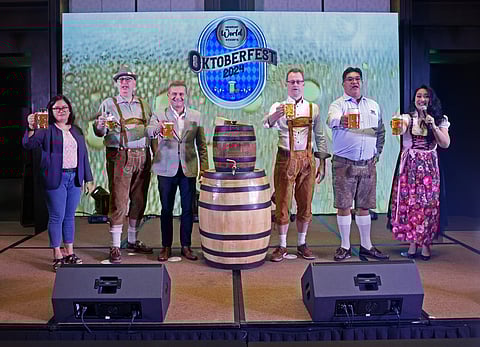 NEWPORT World Resorts chief marketing officer David Jorden (third from left) and Hilton Manila general manager John Lucas (third from right) led the ceremonial first tapping of the first keg of Oktoberfest 2024 at NWR. Also present were (from left) Distributors of Weihenstephan Brewery products managing director Larelen Go Dagondon, NWR vice president for F&B operations Knut Becker, Hilton Manila director for operations Iulai Sau and host Eiffelene Howard.

