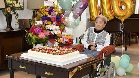 A handout photo taken on May 23, 2024 by the Ashiya City government shows Tomiko Itook, ebelieved to be the world's oldest living person, celebrating her 116th birthday 