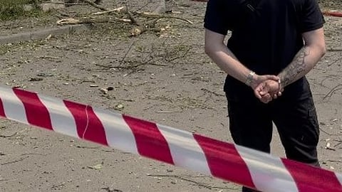 (FILES) Police stand in a cordon 
