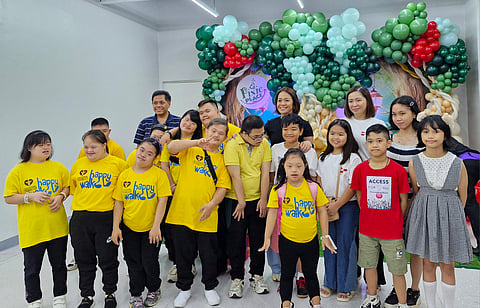 From left: Mitch A. Dumlao, FVP and Retail Business Unit Head, Filinvest Malls; Denise O. Lagayan, VP and Corporate Marketing Head, Filinvest Malls; and Yvette P. Dizon, Deputy General Manager, Festival Mall Alabang, celebrate the opening of Pixie Place with children from the Down Syndrome Association of the Philippines, Inc. (DSAPI) and Hemophilia Advocates Philippines (HAP). 
