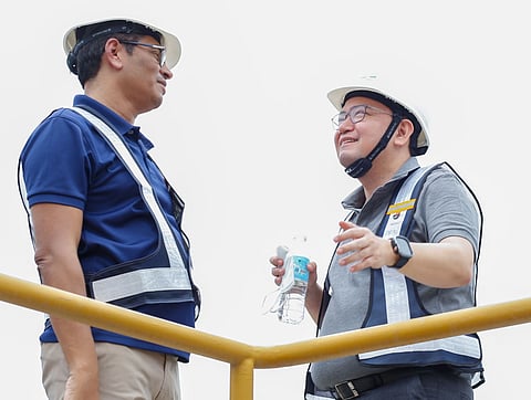 Acting Cebu City Mayor Raymond Garcia (right) gets updated on the Binaliw waste facility from Prime Infra Technical Advisor Paul Puthenpurekal.
