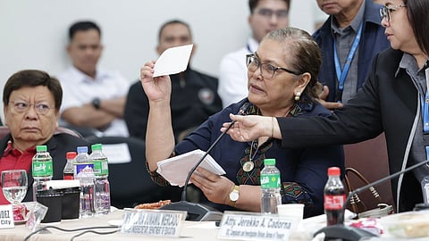 Former Department of Education undersecretary Gloria Mercado shows to the House Committee on Good Government and Public Accountability nine envelopes Vice President Sara Duterte allegedly given to her from February 2023 to September of the same year.  