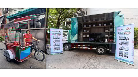 MICRO entrepreneur Sheila Sagao rides the PLDT-Smart Cart. MVP Mobile Library with its array of high-tech educational tools.