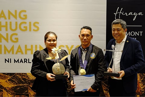 (From left) Mayann Malapote, director of Operations of Belmont Hotel Manila, artist Marlon Lucenera and Socrates Alvaro, cluster general manager of Belmont Hotel Manila.