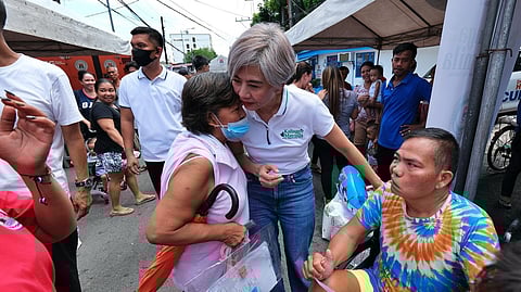 (FILE PHOTO) Manila Mayor Honey Lacuna speaks to residents of Paco, Manila as she spearheaded the "Kalinga sa Maynila" program which provided free medical and other assistance on Wednesday.
