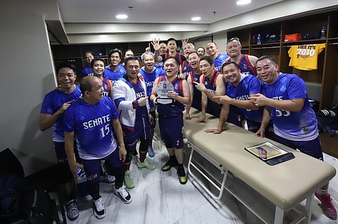 Senator Christopher ‘Bong’ Go (middle) shares his Mythical Team honors with his Senate Sentinels teammates after they beat the AFP Cavaliers, 74-62, to win the 2024 UNTV Cup Executive Face-Off title.