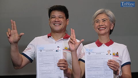 (FILE PHOTO) Incumbent Manila Mayor Lacuna and Vice Mayor Yul Servo Nieto pose for a photo with their certificate of candidacy after filing for re-election in the upcoming midterm elections on Thursday, 3 October 2024. 