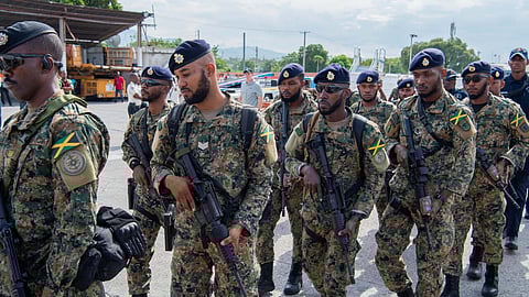 Jamaican soldiers and police officers arrive at Toussaint Louverture International Airport in Port-au-Prince, Haiti, on September 12, 2024, as part of an international policing mission 