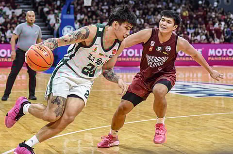 Reigning MVP Kevin Quiambao anchors defending champion De La Salle University's 68-56 win over UP to end the first round of the UAAP Season 87 men's basketball tournament.