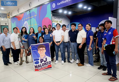 Former Caloocan City councilor PJ Malonzo – the son of former Mayor Rey Malonzo -- is seeking the city’s vice mayoralty post as he files his certificate of candidacy at the SM City Grand Central in Sunday. He will be the running mate of former Senator Antonio Trillanes IV, who is seeking the city’s local chief executive post. Photo/Analy Labor