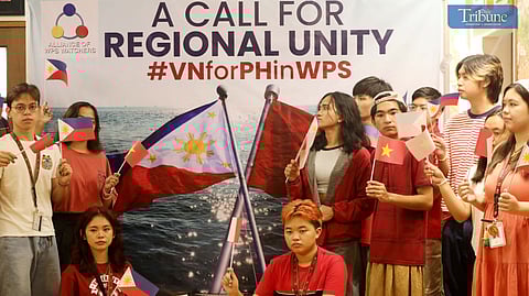 Members of the Alliance of West Philippine Sea Watchers waved Philippine and Vietnamese flags and shouted slogans during a press conference at a restaurant in Quezon City on Thursday, 10 October 2024. In response to China's aggressive actions in the West Philippine Sea, the group called for a united ASEAN response, particularly from Vietnam, to assist the Philippines in defending its sovereignty and safeguarding shared maritime interests. They stressed that a collaborative approach is crucial for maintaining international law and regional stability. Photos by ANALY LABOR 