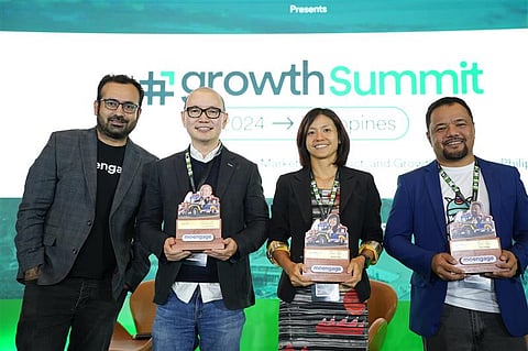 Bayad President and Chief Executive Officer Lawrence Y. Ferrer (second from the left) with his fellow panel speakers during the 2024 Growth Summit at the Grand Hyatt, Bonifacio Global City, Taguig, Metro Manila.