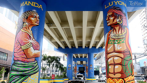 The Shaw Boulevard flyover in Mandaluyong features a colorful painting of Manda and Luyong, highlighting one of the stories behind the city's ancient name. According to legend, the city was named after the romance of a tribal couple, Manda and Luyong. Manda was the lovely daughter of a barangay chieftain, while Luyong was a maharlika whom Manda's father despised. Photos by ANALY LABOR