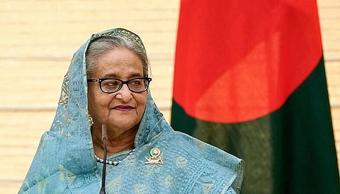Bangladesh’s former prime minister Sheikh Hasina speaks during a press statement in Tokyo on April 26, 2023. 