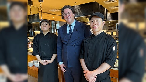 Conrad Manila general manager Fabio Berto flanked by Korean chefs Jun Mok Lee (left) and Younghun Hwang (right).