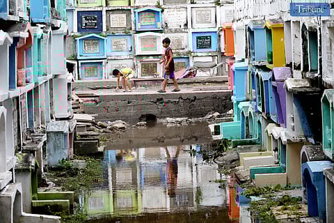 Some people visit their deceased loved ones early to pay tribute at Karuhatan Cemetery on Sunday, 20 October 2024, ahead of the All Souls Day celebration to avoid crowds.