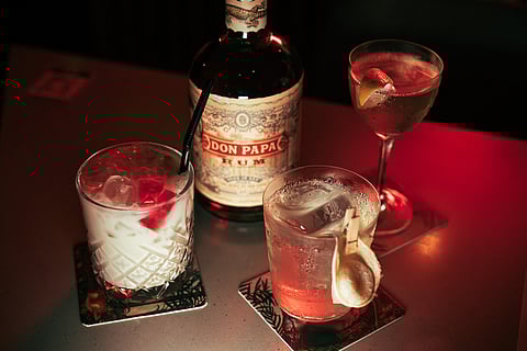 Three of the six panghimagas-inspired cocktails .