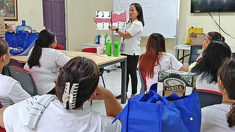 Muntinlupa City Technical Institute’s trainer Melanie Merani discusses hairdressing techniques to the residents of Haven for Women. 