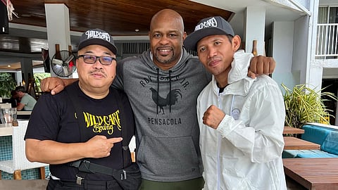 Michael Dasmariñas (right) and trainer Ting Ariosa (left) run into boxing legend Roy Jones Jr. in the Cayman Islands just before the Filipino southpaw crushed Eduardo Esquivel in the first round of their featherweight duel.
