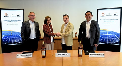 At the signing of the green energy deal are (from left) Anglo Watsons Glass Inc. president Alec Tempongko, MSpectrum president and CEO Ma. Cecilia Domingo, Emperador Distillers president and CEO Winston Co and MSpectrum COO Patrick Henry Panlilio.