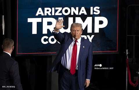 Former US President and Republican presidential candidate Donald Trump waves as he leaves after speaking during a campaign event at the Tucson Music Hall in Tucson, Arizona, September 12, 2024. Donald Trump won the state of Arizona in this week's US presidential election, US TV networks projected on November 9, 2024, completing the Republican's sweep of all seven swing states.
Rebecca NOBLE / AFP