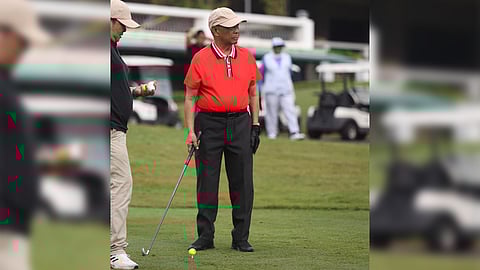 former Vice President Jojo Binay prepares to hit the ceremonial ball ushering in the Binay Cup at the Alabang Country Club in Muntinlupa on Monday.