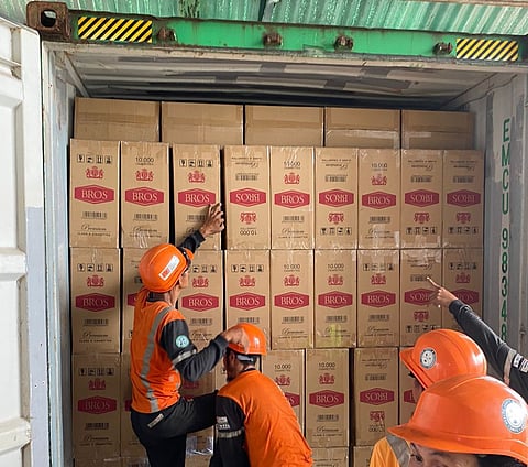 THE Department of Agriculture (DA) and the Philippine National Police inspect onions sold at Paco Market in Manila on 18 June, as the DA intensifies its crackdown on agricultural smuggling under the new Anti-Agricultural Economic Sabotage Act.