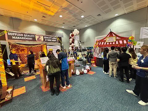 Guests experiencing the interactive booths at Unilab’s celebration of World Quality Day
