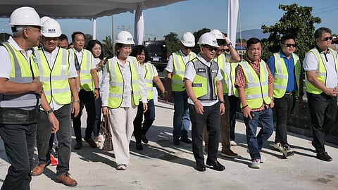NLEX Corp. president and general manager J. Luigi L. Bautista leads the inspection of Candaba 3rd Viaduct, which will open next month.  (See story on page 11)