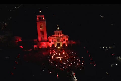 Minor Basilica of Our Lady of Manaoag in Pangasinan lights up in red on 27 November (Screenshot from ACN Philippines video  via CBCP)