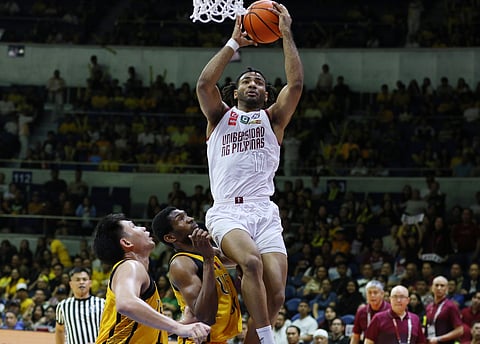Francis Lopez leads the UP Fighting Maroons to a 78-69 victory over UST to make the finals of the UAAP Season 87 basketball tournament on Saturday.