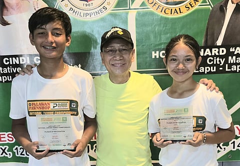 Matthew Morris (left) and Danica Diamante (right) pose with Lapu-Lapu Tennis Club president Fiscal Ruso Zaragoza after scoring impressive back-to-back championship wins in the Lapu-Lapu City National Junior Championships over the weekend.