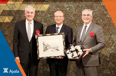 Golden ties Ayala Corp. recently celebrated in Tokyo, 50 years of partnership with Japan’s Mitsubishi Corp. Exchanging partnership memorabilias are (from left) Fernando Zobel de Ayala, member of the board of directors of AC; Mitsubishi Corporation president and CEO Takehiko Kakiuchi and AC chairperson Jaime Augusto Zobel de Ayala.