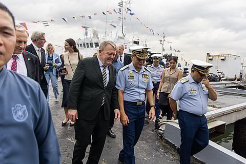 DANISH Foreign Minister Lars Løkke Rasmussen is given a brief tour of the Philippine Coast Guard headquarters in Manila on Monday as part of his official visit to the Philippines. He discussed enhancing bilateral maritime security and defense cooperation amid rising tensions in the West Philippine Sea.