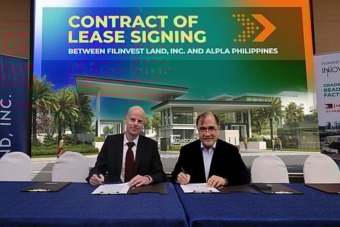 (From left) ALPLA Philippines country manager Christian Kotschy with Filinvest Land Inc. SVP and business unit head of Industrial and Logistics Francis Ceballos during the Contract of Lease signing ceremony. 