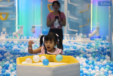 Children, joined by their parents, delight in the attractions of Fantasy World, an indoor amusement park at SM Masinag in Antipolo City, on Saturday, 14 December 2024.
