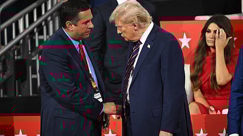 MILWAUKEE, WISCONSIN - JULY 17: (L-R) U.S. Rep. Devin Nunes (R-CA) and Republican presidential candidate, former U.S. President Donald Trump speak on the third day of the Republican National Convention at the Fiserv Forum on 17 July 2024 in Milwaukee, Wisconsin. Delegates, politicians, and the Republican faithful are in Milwaukee for the annual convention, concluding with former President Donald Trump accepting his party's presidential nomination. The RNC takes place from 15-18 July.