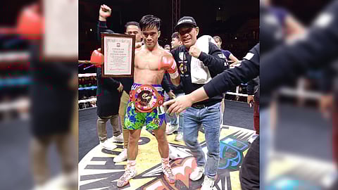 Kenneth Llover and his lead trainer Jonathan Peñalosa beam with pride after their successful teamup in Osaka last Sunday. 