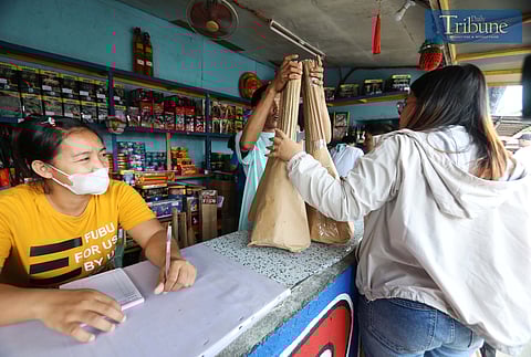 On Friday, 27 December 2024, people flock to various stalls in Bocaue, Bulacan, known as the fireworks capital of the Philippines, to purchase pyrotechnics for the holiday season.