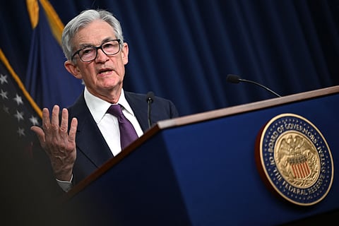 US Federal Reserve chairman Jerome Powell gestures as he speaks at a briefing after the Monetary Policy Committee meeting in Washington, DC, on 18 December 2024. The US Federal Reserve signaled a slower pace of cuts ahead, amid uncertainty about inflation and US President-elect Donald Trump’s economic plans. Policymakers voted 11-to-1 to lower the central bank’s key lending rate to between 4.25 percent and 4.50 percent, the Fed announced in a statement. They also penciled in just two quarter-point rate cuts for next year, and sharply hiked their inflation outlook for 2025.
